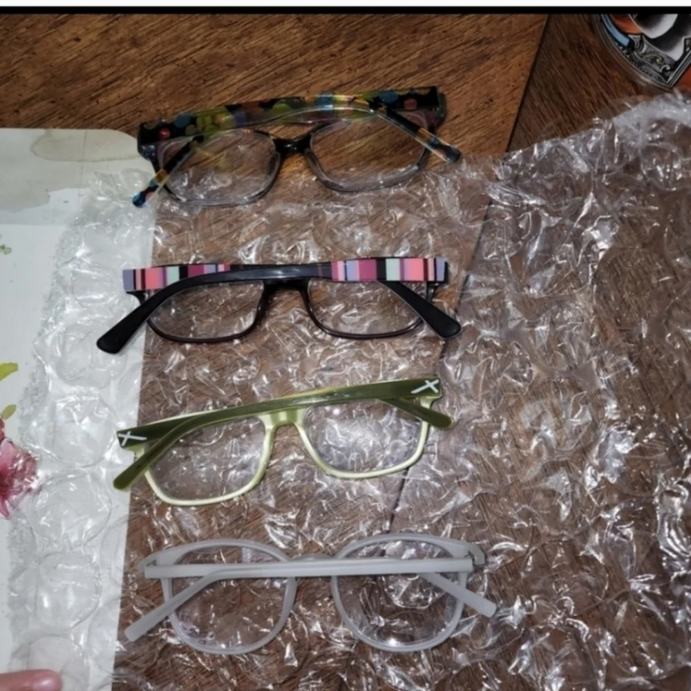 4 pairs of prescription eyeglasses